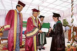 HP Governor V.S. Kokje confers a degree on a student during the convocation of the Y.S. Parmar University of Horticulture and Forestry at Nauni on Wednesday