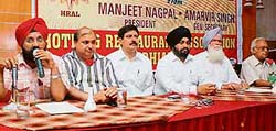 Members of the Hotel and Restaurant Association of Ludhiana at the launch of the associations website in Ludhiana
