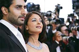 Abhishek Bachchan and his wife Aishwarya Rai Bachchan pose upon arriving at the Festival Palace for the opening ceremony of the 60th edition of the Cannes Film Festival, southern France, on Wednesday.