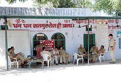 After a clash between Sikhs and Dera Sacha Sauda supporters, the police is guarding the dera at Kambopura near Karnal on Friday.