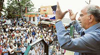Former Chief Minister Shanta Kumar addresses a public rally in Summer Hill in support of the BJP candidates for the MC elections in Shimla on Friday.
