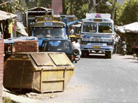 A dustbin put up by the Municipal Council, Nurpur, on the Pathankot-Mandi highway at Chogan.
