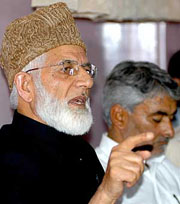APHC chairman Syed Ali Shah Geelani addresses a press conference in Srinagar on Friday.
