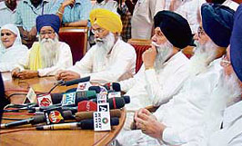SAD president Parkash Singh Badal presides over a meeting of the political affairs committee (PAC) at Chandigarh on Friday.