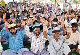 Followers of Dera Sacha Sauda stage a dharna at Naam Charcha Ghar in Patiala on Friday.