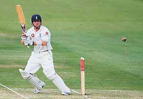 Englands Paul Collingwood plays a shot off the bowling of the West Indies Corey Collymore during the second day of the first Test at Lords