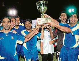 The jubilant BPCL team after winning the 5th Olympian Dharam Singh Memorial Six-a-Side Hockey Tournament-2007 at the hockey stadium, Sector 18, Chandigarh, on Saturday. 