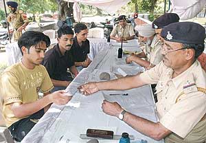 A verification camp for servants, tenants and paying guests in progress at Sector 8, Chandigarh, on Saturday.