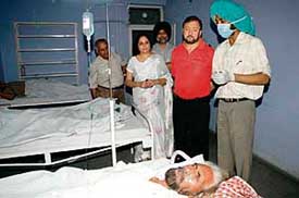 Dr Narinder Singh with chairman and principal of Desh Bhagat Ayurvedic College and Hospital at a medical camp organised at the college in Mandi Gobindgarh on Saturday.
