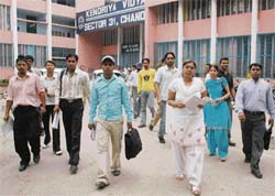 Aspirants come out of Kendriya Vidyalaya, Sector 31, after taking the Civil Services preliminary examination on Sunday. Hundreds appeared in the exam at 28 centres in Chandigarh