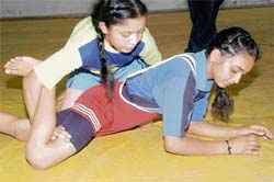 A match in progress at the Wrestling Coaching Centre in Sector 30, Chandigarh, on Sunday