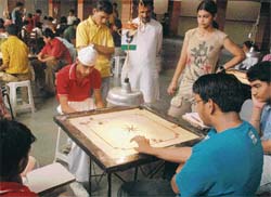 A carrom game in progress at St Stephens School in Chandigarh on Sunday.