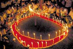 Representatives of various NGOs gather at Jantar Mantar in the Capital on Sunday to mark Candlelight Memorial Day