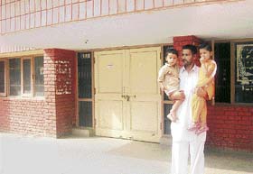 Disappointed, a man returns from the Civil Hospital, Mandi Ahmedgarh, without getting his children administered polio drops