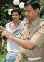 Abeyjit Singh in police custody. 
