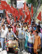 Supporters of the CPI and the CPM hold a rally on the last day of campaigning for the MC poll in Shimla on Monday.
