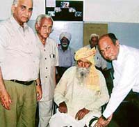 A physically challenged person gets free prosthesis at a camp organised by Mahavir Viklang Help Centre in Ludhiana
