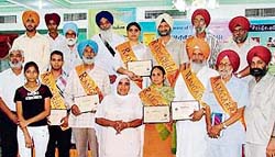 Guests pose for a photograph at the release function of Ramgarhiakom-Vol-3 in Ludhiana