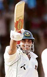 Bangladeshs Mashrafe Mortaza celebrates on completing his fifty on the fourth day of the first Test against India in Chittagong on Monday. 