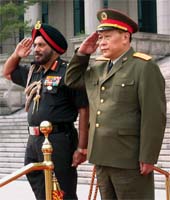 Army Chief Gen J J Singh along with the Chief of Staff of the Chinese People's Liberation Army Gen Liang Guanglie at the ceremonial welcome at the headquarters of the Chinese Ministry of Defence in Beijing on Monday