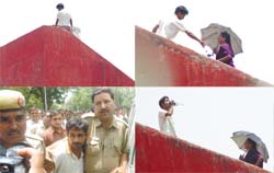 (Clockwise) A visitor succeeded in convincing a desperate man to swallow the idea of committing suicide with draughts of cold water at the Jantar Mantar in the Capital on Tuesday afternoon. He was taken away by the police for violating the sacred right to life. 