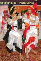 Students of HMV Nursing College present a bhangra in Jalandhar.