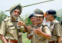 Punjab DGP N.P.S. Aulakh (left), DIG J.K. Jain and other senior officials in Bathinda on Wednesday.