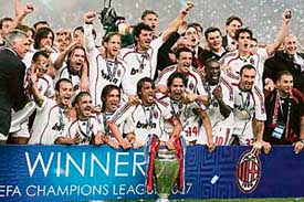 AC Milans team celebrate after winning the Champions League final against Liverpool at the Olympic Stadium in Athens on Wednesday. 