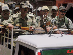 Paramilitary personnel patrol in Sirsa on Saturday after a threat given by several Sikh organisations to Sacha Sauda deras in Punjab.