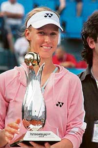 Russias Elena Dementieva holds the trophy after beating Frances Aravena Rezai in the final of the Istanbul Cup tennis tournament