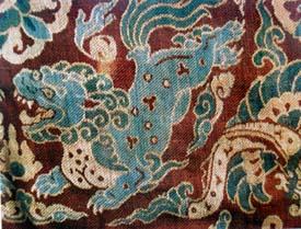Mythical creature: part lion, part dragon. Fragment of woven silk from the Liao dynasty; China, 10th century