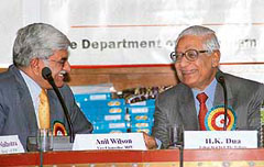 Editor-in-Chief of The Tribune group of newspapers H.K. Dua (right) interacts with vice- chancellor of HP University Anil Wilson during the national seminar on Contemporary issues in mass communication held at the Law Department in Shimla on Sunday.