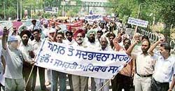 Activists of the Association for Democractic Rights take out a procession to urge people to maintain peace in the state in wake of the Dera controversy in Ludhiana on Sunday