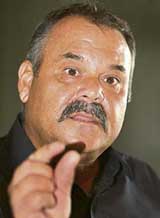Bangladeshs outgoing coach Dav Whatmore addresses a press conference in Dhaka on Monday.
