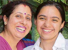 Kanika Kapila, who topped in Panchkula with 97.2 per cent marks with her mother.