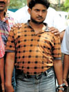 Nandu and Deepak, accused in murder cases, in police custody.