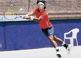 Sunil Sipaeya in action during a second-round match of the ITF Tournament at the CLTA, Sector 10, Chandigarh