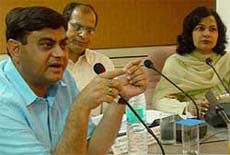 K.K. Khandelwal, labour commissioner(left), Manik Sonawane, principal secretary, labour(centre) and Sharda Rathore, parliamentary secretary, addressing a press conference at Chandigarh on Wednesday. 