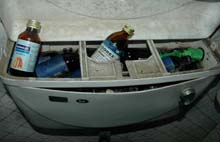 Empty bottles of expectorant lying in a toilet tank of DD office in Jalandhar 