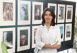 Isha Sharma poses with her pictures that form part of Australian Exposition, an exhibition inaugurated at the Chandigarh College of Architecture by principal Rajnish Wattas
