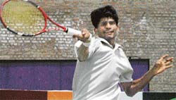 Vishal Punna returns a shot during the ITF tournament at the CLTA in Chandigarh