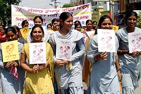 Students carry placards at a rally to mark World No-Tobacco Day in Jalandhar on Thursday.