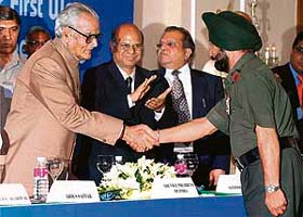 Vice-president Bhairon Singh Shekhawat congratulates Captain Bana Singh for receiving Param Veer Chakra' in Kolkata