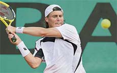 NEVER SAY DIE: Lleyton Hewitt of Australia in action against Gaston Gaudio of Argentina during the second round of the French Open in Paris on Thursday. Hewitt won 4-6, 3-6, 6-2, 6-4, 6-2.  AFP photo