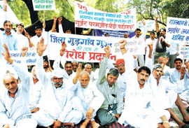 Activists of Gurgaon Gujjar Samaj shout anti-Vasundhara Raje slogans at Jantar Mantar in the Capital on Friday.