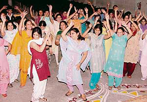 Teachers of Bhawan Vidyalaya, Sector 15, Panchkula, dance with gay abandon at the conclusion of a week-long theatre workshop in the school on Saturday.