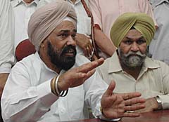 State Congress chief Shamsher Singh Dullo addresses a press conference in Jalandhar on Sunday.