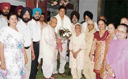 Senior BJP leader Lala Lajpat Rai felicitates state party president Rajinder Bhandari at a function in Ludhiana on Sunday.