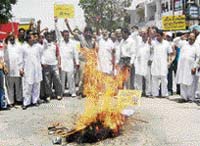 Gujjars burn an effigy of Rajasthan Chief Minister Vasundhra Raje in Ludhiana on Sunday.
