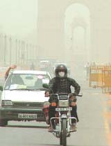 A view of Raj Path blurred by dust on Monday morning in the Capital.